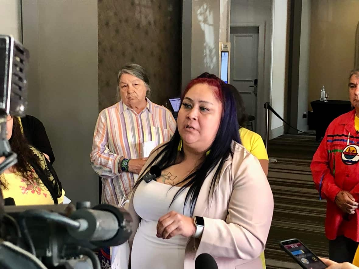 Martha Martin, mother of Chantel Moore, speaks after the second day of testimony at the inquest into her daughter's death. Wolastoqi elder Alma Brooks stands beside her. (Jennifer Sweet/CBC - image credit)