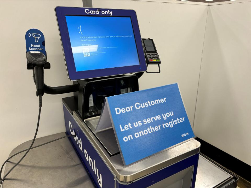 A blue error screen on a register is seen at a departmental store affected by a cyber outage in Brisbane, Australia, July 19, 2024.