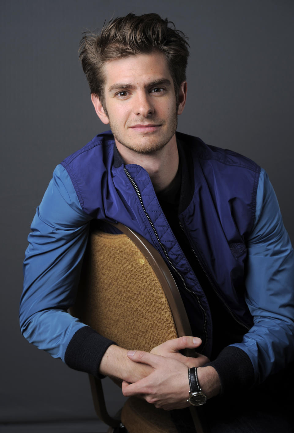 In this Friday, July 19, 2013 photo, actor Andrew Garfield poses for a portrait on Day 3 of Comic-Con International in San Diego. Garfield stars in "The Amazing Spider-Man 2," set for release next year. (Photo by Chris Pizzello/Invision/AP)