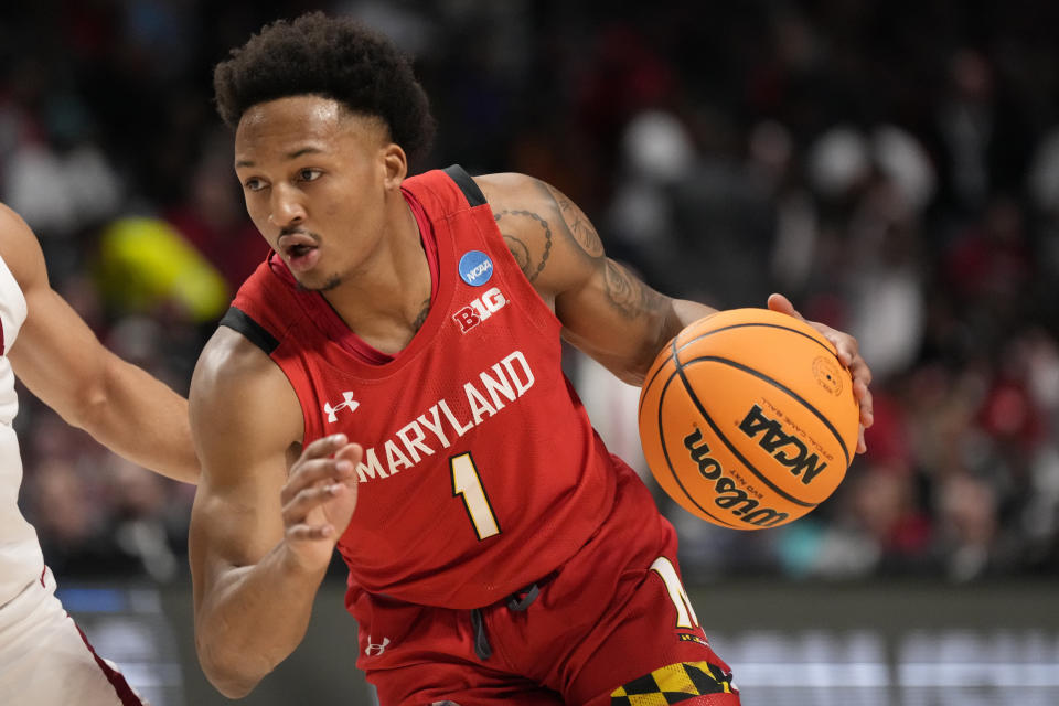 FILE - Maryland guard Jahmir Young (1) dribbles upcourt in the first half of a second-round college basketball game against Alabama in the NCAA Tournament in Birmingham, Ala., Saturday, March 18, 2023. Maryland returns three of its top four scorers from last season in Jahmir Young, Donta Scott and Julian Reese. Young averaged 15.8 points per game in his first season with the Terps after transferring from Charlotte. (AP Photo/Rogelio V. Solis, File)