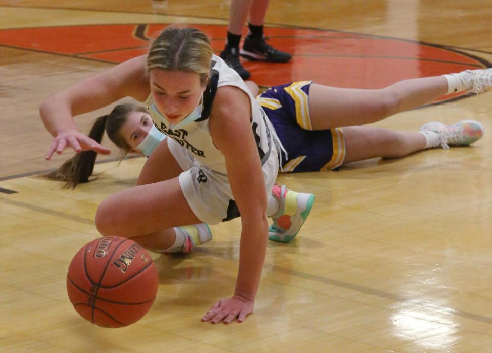 East Rochester's Samantha Lewis (3), front, scrambles for the loose ball after a collision with Clyde-Savannah's Taylor Carnevale (5), back, sent them both to the floor during their game Thursday, Jan. 20, 2022 at East Rochester High School. 