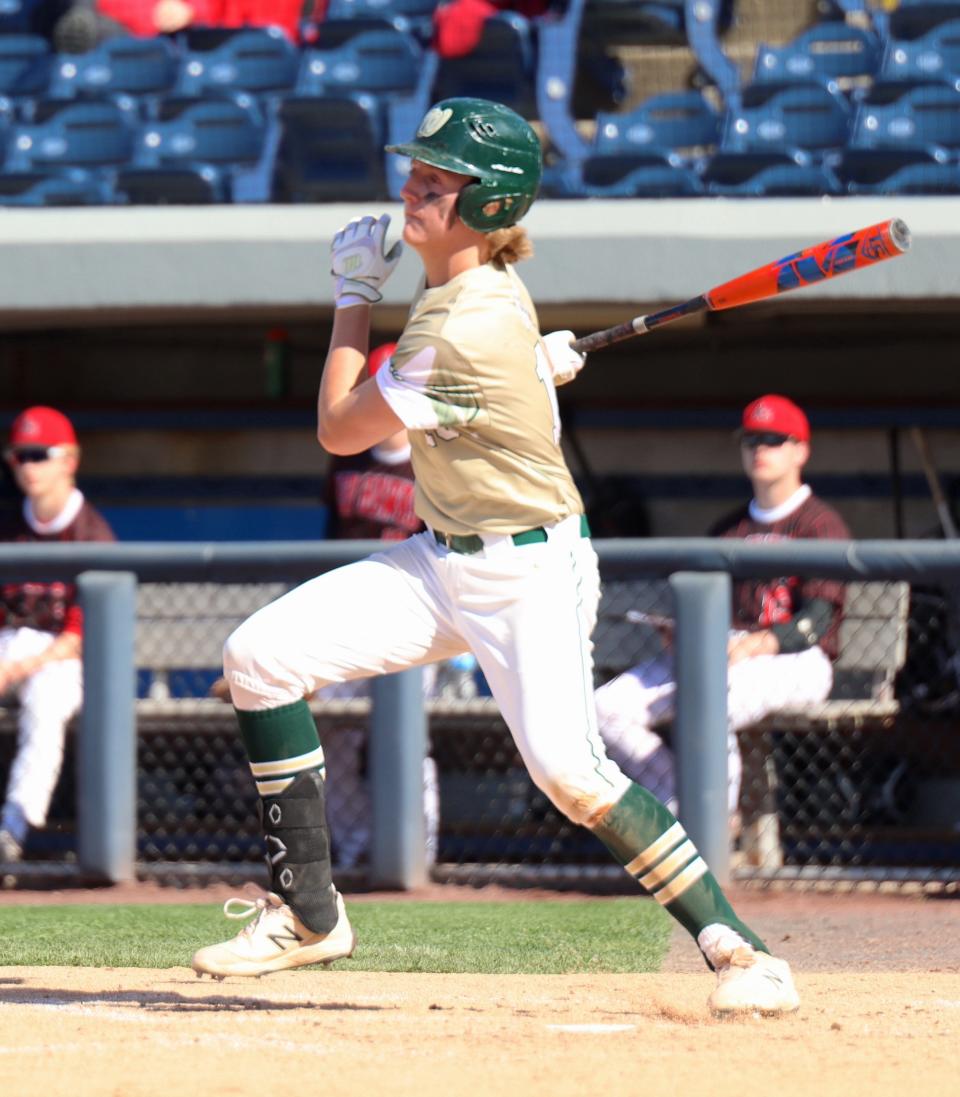 Josh Agar swings the bat n a doubleheader against Cedar Springs at LMCU Ballpark