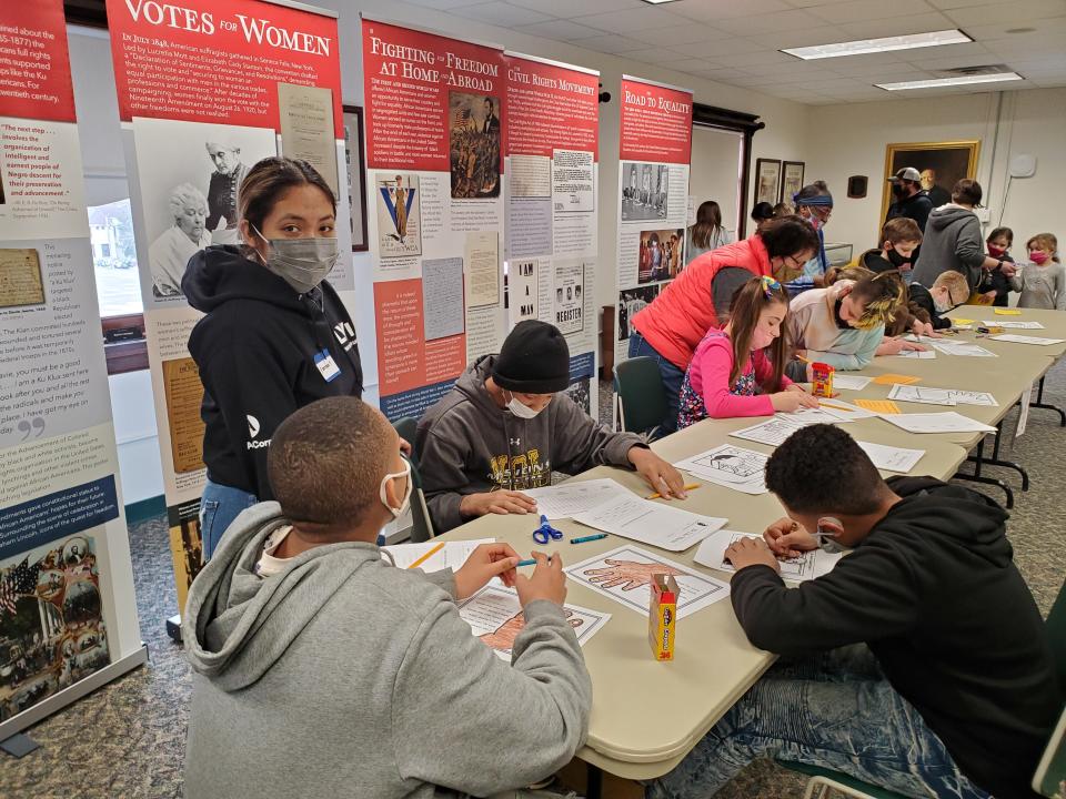 Kids participated in activities and received free books for attending.