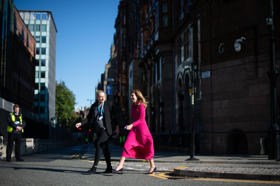 Carrie Johnson's hot pink dress stood out from the Trooping the Colour crowd