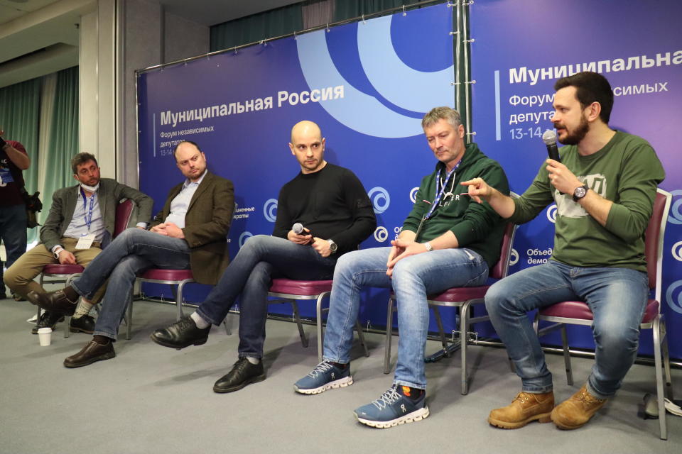 Russian opposition figures (R-L)Ilya Yashin, Yevgeny Roisman, Andrei Pivovarov and Vladimir Kara-Mursa sit at a gathering of the Russian opposition, known as the United Democrats, before it was broken up by police, in Moscow, March 13, 2021. / Credit: Hannah Wagner/dpa/Getty