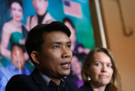 Singer Yorn Young (L) speaks during a news conference in Phnom Penh, Cambodia, March 6, 2018. REUTERS/Samrang Pring