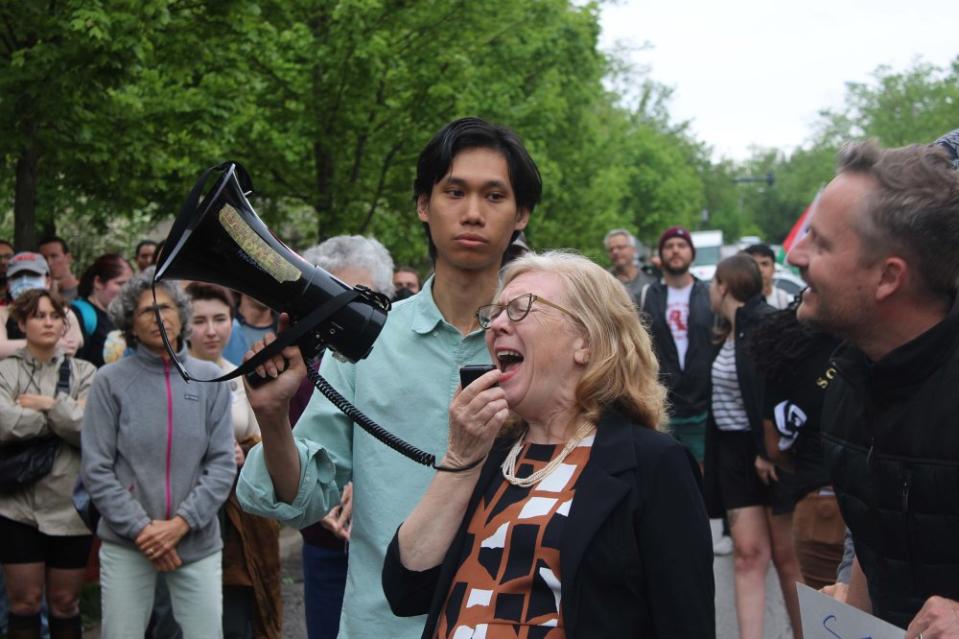 Indiana professor Barbara Dennis yells into a megaphone at the Rally for Resignations at Bryan Hall on April 29. Dennis was arrested, along with 32 other protesters, at the pro-Palestinian encampment at Dunn Meadow on April 25.<span class="copyright">Taylor Satoski for The Indiana Daily Student</span>