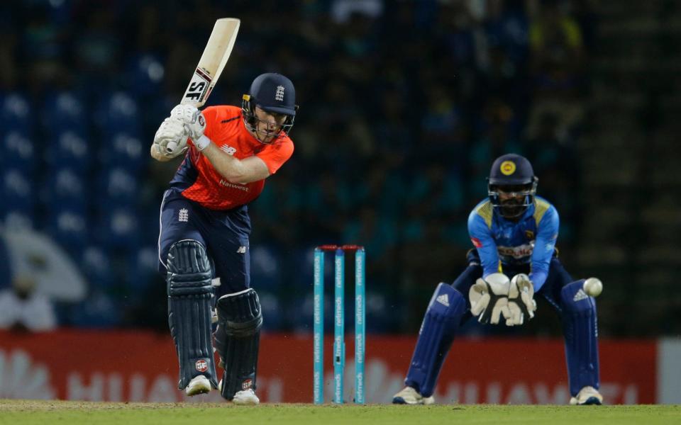 Eoin Morgan on his way to his match-winning half century - AP