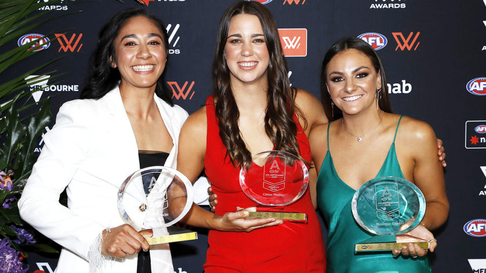 Darcy Vescio, Chloe Molloy and Monique Conti, pictured here with their AFLW All-Australian awards. 