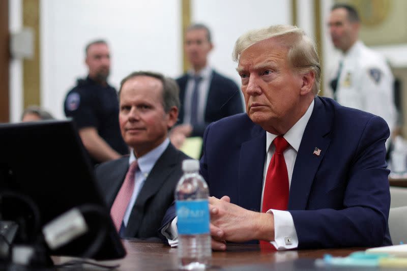 FILE PHOTO: Former U.S. President Donald Trump attends the Trump Organization civil fraud trial, in New York