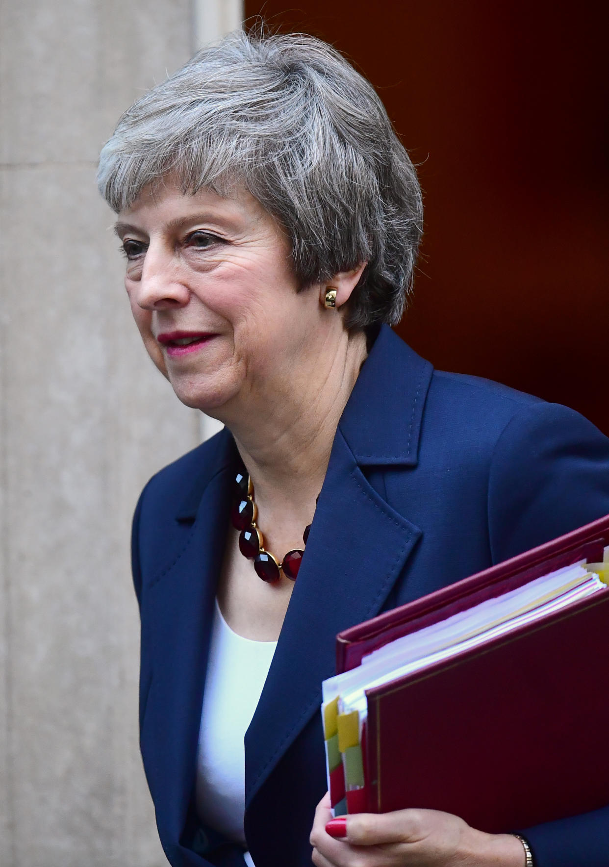 Prime Minister Theresa May leavies 10 Downing Street ahead of Prime Minister’s Questions (PA Images)