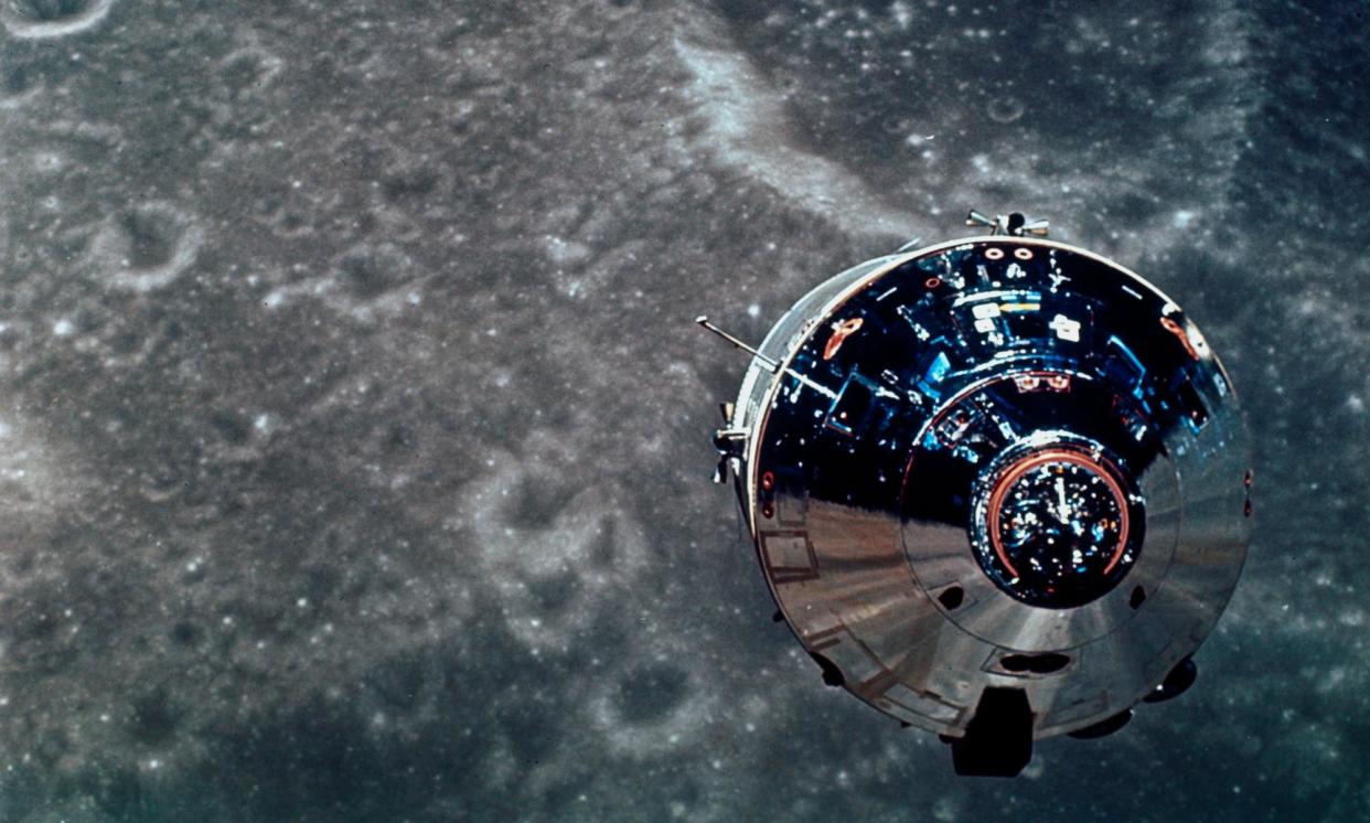 <span>The Apollo 10 command module is shown in lunar orbit over the far side of the moon two months before the Apollo 11 landing in 1969.</span><span>Photograph: Science & Society Picture Library/SSPL/Getty Images</span>