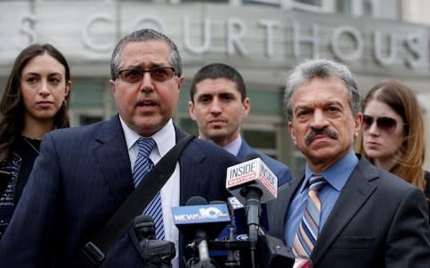 Attorneys representing Nxivm leader Keith Raniere, Marc Agnifilo (l) and Paul DerOhannesia speak after a hearing - Credit: Reuters