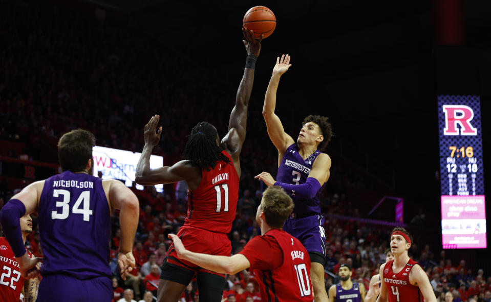 Rutgers center Clifford Omoruyi (11) blocks the shot of Northwestern guard Ty Berry (3) during the first half of an NCAA college basketball game, Sunday, Mar.5, 2023 in Piscataway, N.J. (AP Photo/Noah K. Murray)