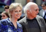 Jane Lynch and Larry David arrive at the Hollywood premiere of "The Three Stooges: The Movie" in Los Angeles, April 7, 2012.