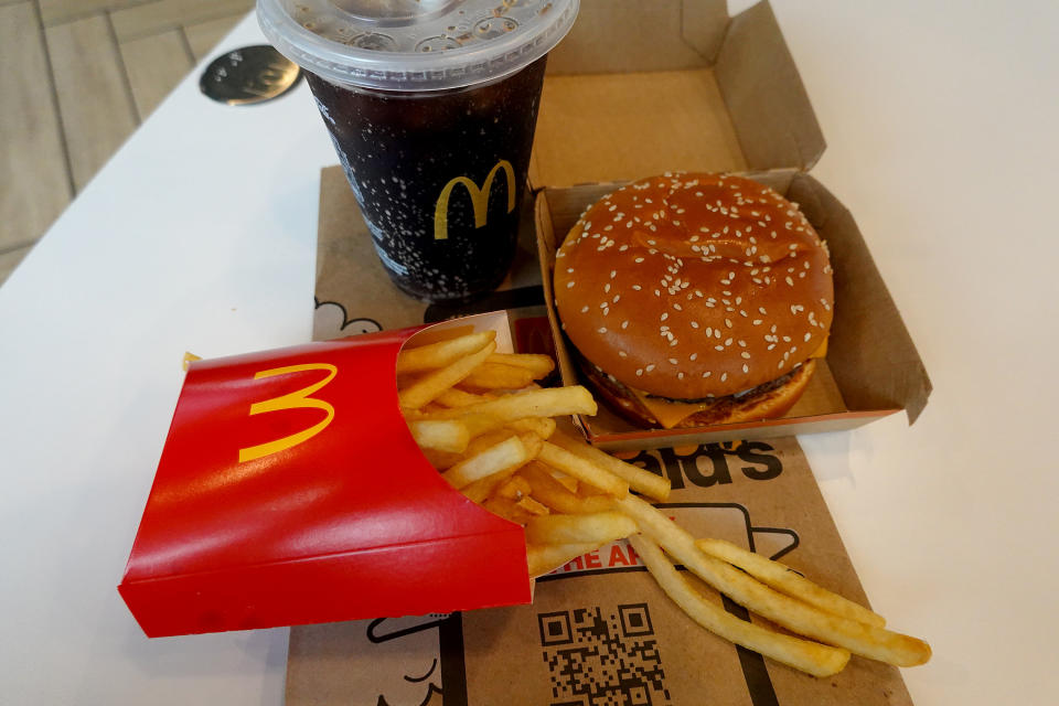 McDonald's food sits on a table in one of the fast food restaurants on July 26, 2022 in Miami, Florida. (Photo illustration by Joe Raedle/Getty Images)