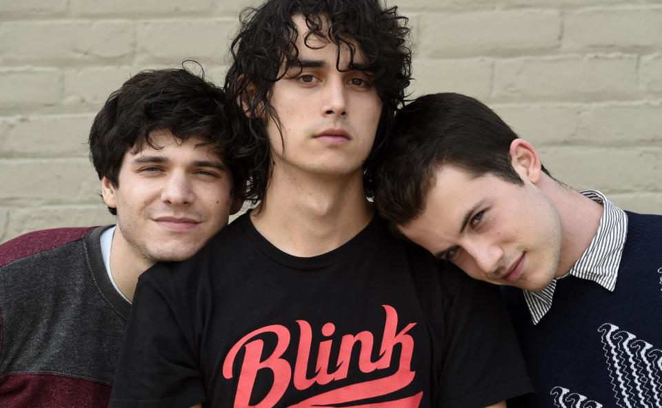 This March 20, 2019 photo shows Braeden Lemasters, from left, Cole Preston and Dylan Minnette of the indie rock band Wallows posing for a portrait at SIR Studios in Los Angeles. (Photo by Chris Pizzello/Invision/AP)