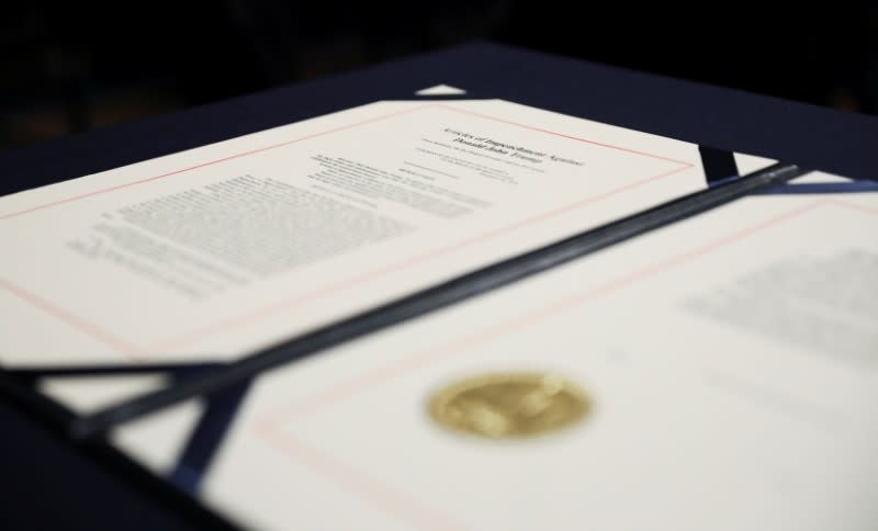 House articles of impeachment of President Trump await U.S. House Speaker Pelosi's signature before engrossment ceremony at the U.S. Capitol in Washington