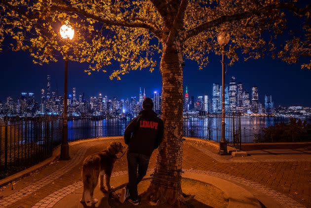 The author and his dog, Oli, take in the view of Manhattan from Weehawken, New Jersey. (Photo: Joe Whittle for HuffPost)