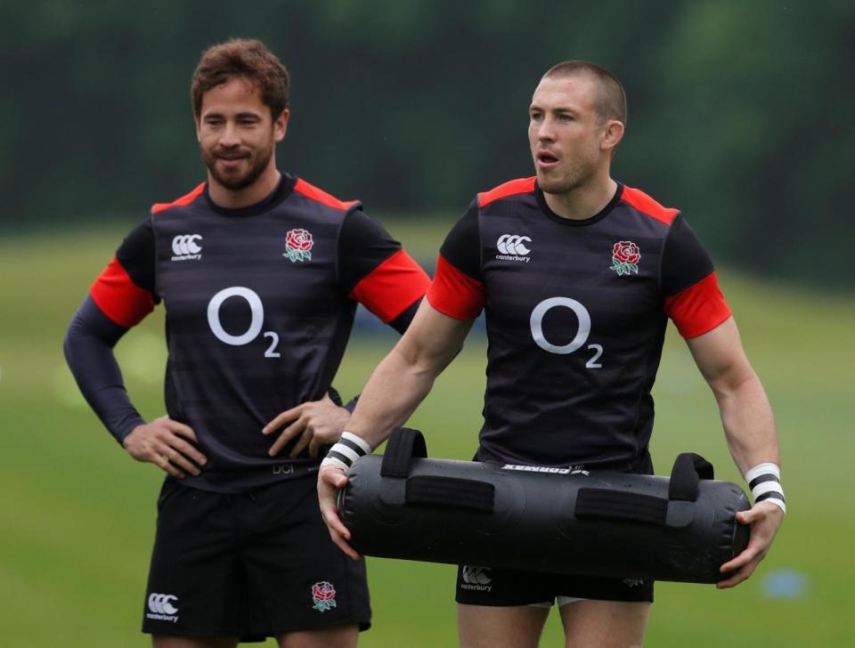 Back in the fold: Cipriani, left, trains ahead of his return to the England XV (REUTERS)