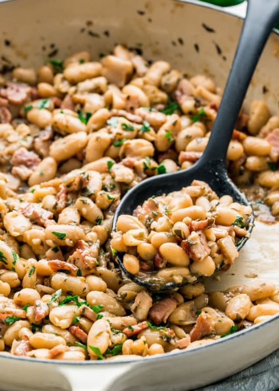 <p>Jo Cooks</p><p>These white beans with bacon and herbs are so simple to make, rich and savory, comforting, loaded with flavor and super delicious. Perfect as a side or a meal on its own.</p><p><strong>Get the recipe: <a href="https://www.jocooks.com/recipes/white-beans-with-bacon-and-herbs/" rel="nofollow noopener" target="_blank" data-ylk="slk:White Beans with Bacon and Herbs;elm:context_link;itc:0;sec:content-canvas" class="link "><em>White Beans with Bacon and Herbs</em></a></strong></p>