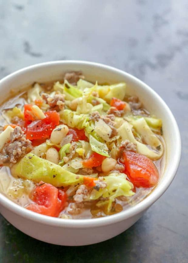 <p><a href="https://barefeetinthekitchen.com/italian-sausage-cabbage-soup-recipe/" rel="nofollow noopener" target="_blank" data-ylk="slk:Barefeet In The Kitchen;elm:context_link;itc:0;sec:content-canvas" class="link ">Barefeet In The Kitchen</a></p>