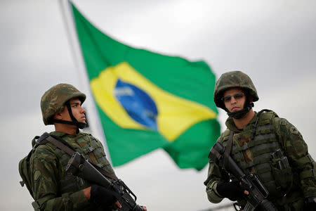 Brazilian marines take part in a security exercise ahead of the 2016 Rio Olympics in Rio de Janeiro, Brazil, July 21, 2016. REUTERS/Ueslei Marcelino