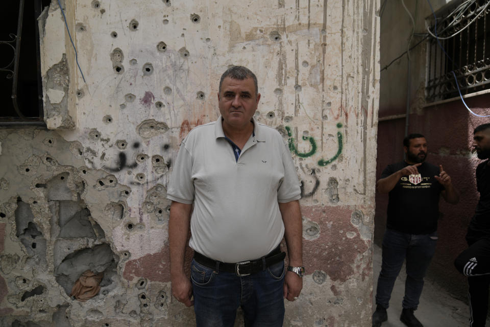 Samer Jaber, father of Abu Shujaa, a military commander of the Islamic Jihad group, pauses for a picture during an interview with the Associated Press, in the West Bank refugee camp of Nur Shams, near Tulkarem, on May 20, 2024. (AP Photo/Nasser Nasser)