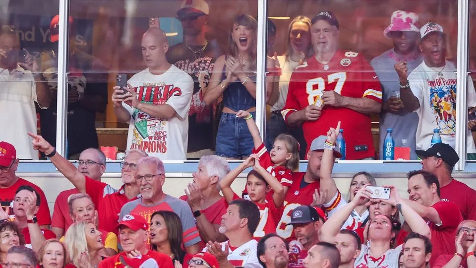 Taylor Swift and Ed Kelce the Chiefs-Ravens game at Arrowhead Stadium in Kansas City on Thursday. - Christian Petersen/Getty Images