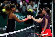 Tennis - WTA Tour Finals - Singapore Indoor Stadium, Kallang, Singapore - October 22, 2018 Sloane Stephens of the U.S. and Japan's Naomi Osaka shake hands after their group stage match REUTERS/Edgar Su