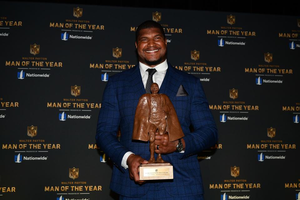 Feb 1, 2020; Miami, Florida, USA; Jacksonville Jaguars Calais Campbell speaks to the media after receiving the Walter Payton NFL Man of the Year award presented by Nationwide NFL Honors awards presentation at Adrienne Arsht Center. Mandatory Credit: Jasen Vinlove-USA TODAY Sports