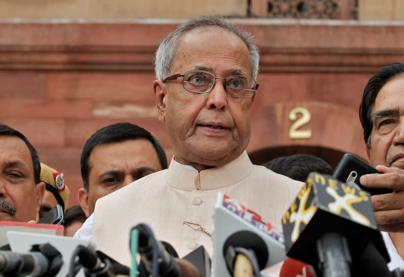 FILE PHOTO: Pranab Mukherjee speaks to media in the run-up to India's presidential election in 2012