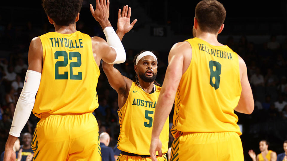 Pictured here, Boomers players celebrate during their win over Team USA. 