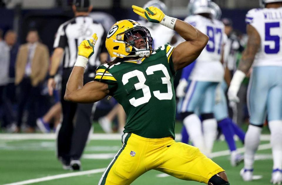 Green Bay Packers running back Aaron Jones celebrates during the third quarter of the NFC wild-card playoff game on Sunday, January 14, 2024, at AT&T Stadium in Arlington. The Dallas Cowboys were defeated 48-32.