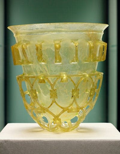 Humans have been creating tools with glass for thousands of years, like this Roman cup from the fourth century. <a href="https://en.wikipedia.org/wiki/File:Roman_diatretglas.jpg#/media/File:Roman_diatretglas.jpg" rel="nofollow noopener" target="_blank" data-ylk="slk:MatthiasKabel/Wikimedia Commons;elm:context_link;itc:0;sec:content-canvas" class="link ">MatthiasKabel/Wikimedia Commons</a>, <a href="http://creativecommons.org/licenses/by-sa/4.0/" rel="nofollow noopener" target="_blank" data-ylk="slk:CC BY-SA;elm:context_link;itc:0;sec:content-canvas" class="link ">CC BY-SA</a>