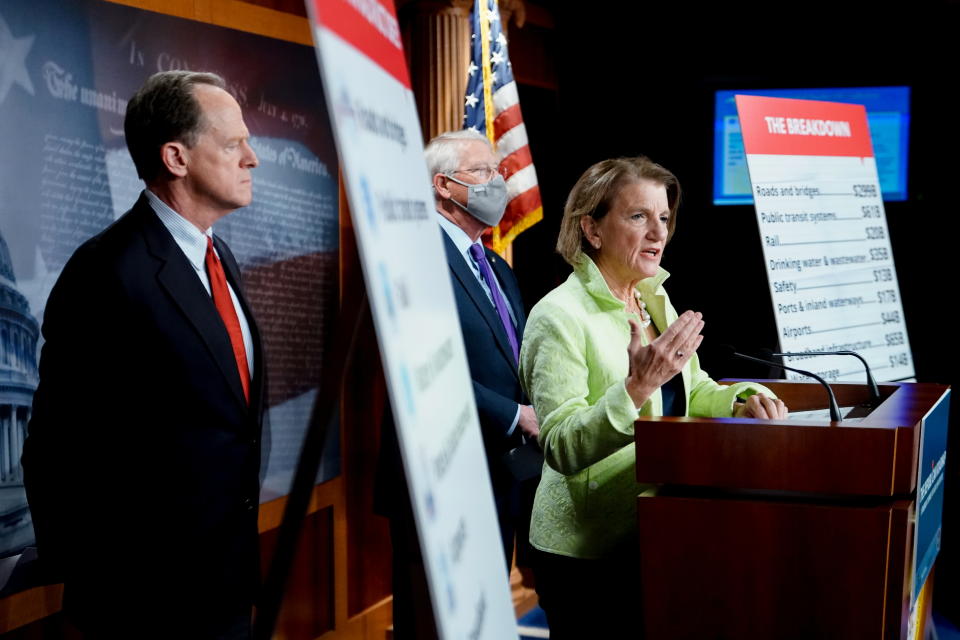 Shelley Capito (R-WV) speaks during a news conference to introduce the Republican infrastructure plan, as Pat Toomey (R-PA) and Roger Wicker (R-MS) stand behind her, at the U.S. Capitol in Washington, U.S., April 22, 2021. REUTERS/Erin Scott