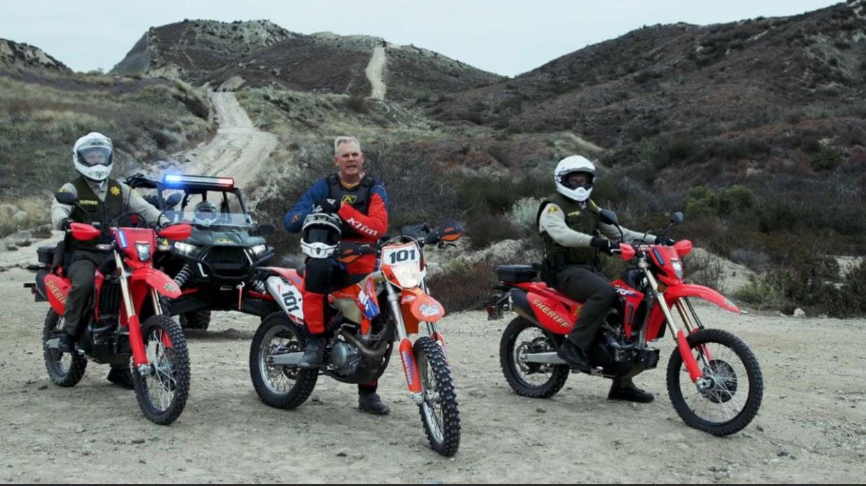 San Bernardino County Sheriff Shannon Dicus, center, with members of the Sheriff’s Off-Highway Vehicle Team as he announces the launch of “Operation Dust Devil,” an off-highway vehicle enforcement and safety program.