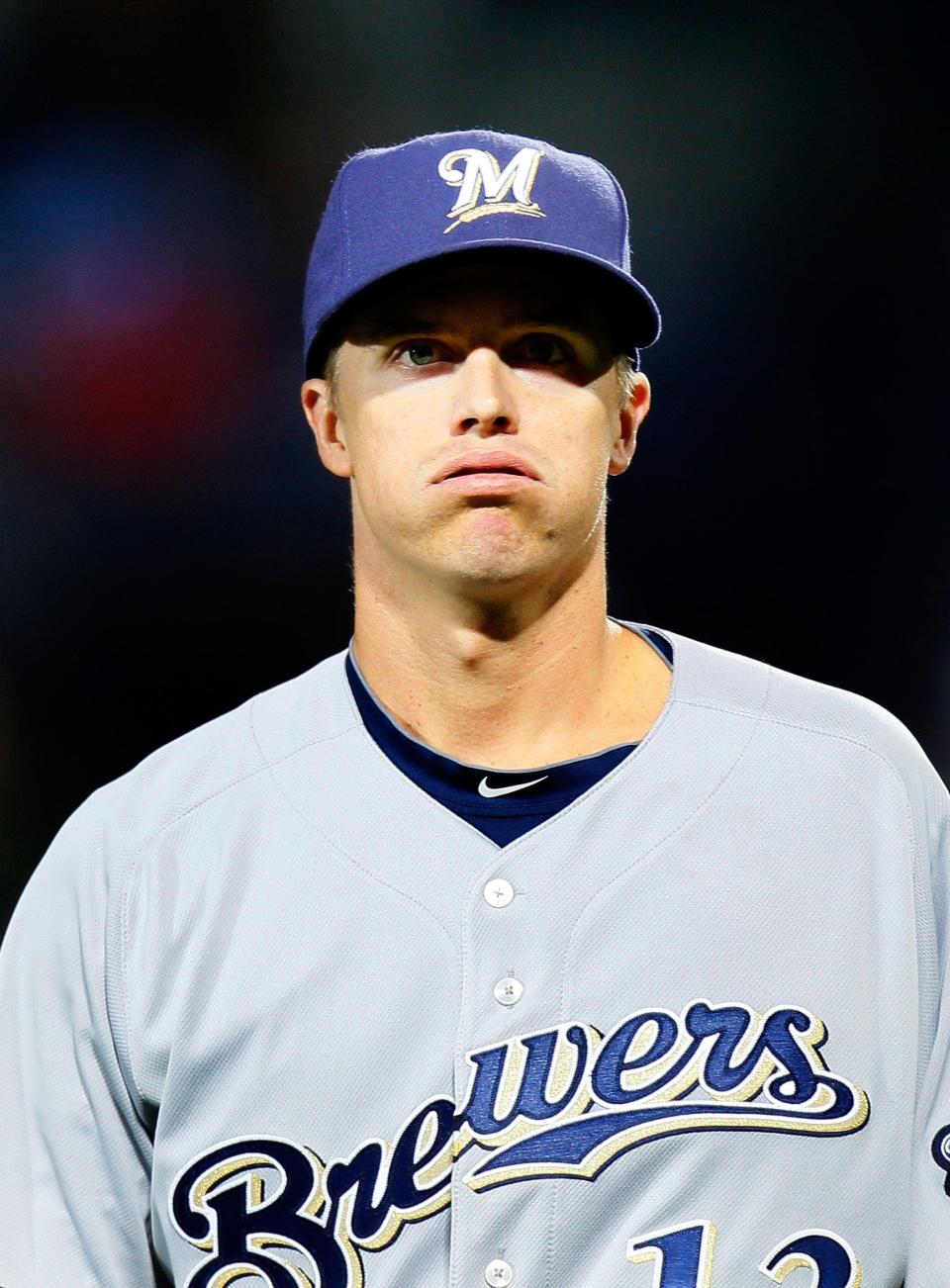 Zack Greinke of the Milwaukee Brewers walks off the field after pitching in the second inning against the Atlanta Braves at Turner Field on May 4, 2011 in Atlanta, Georgia.