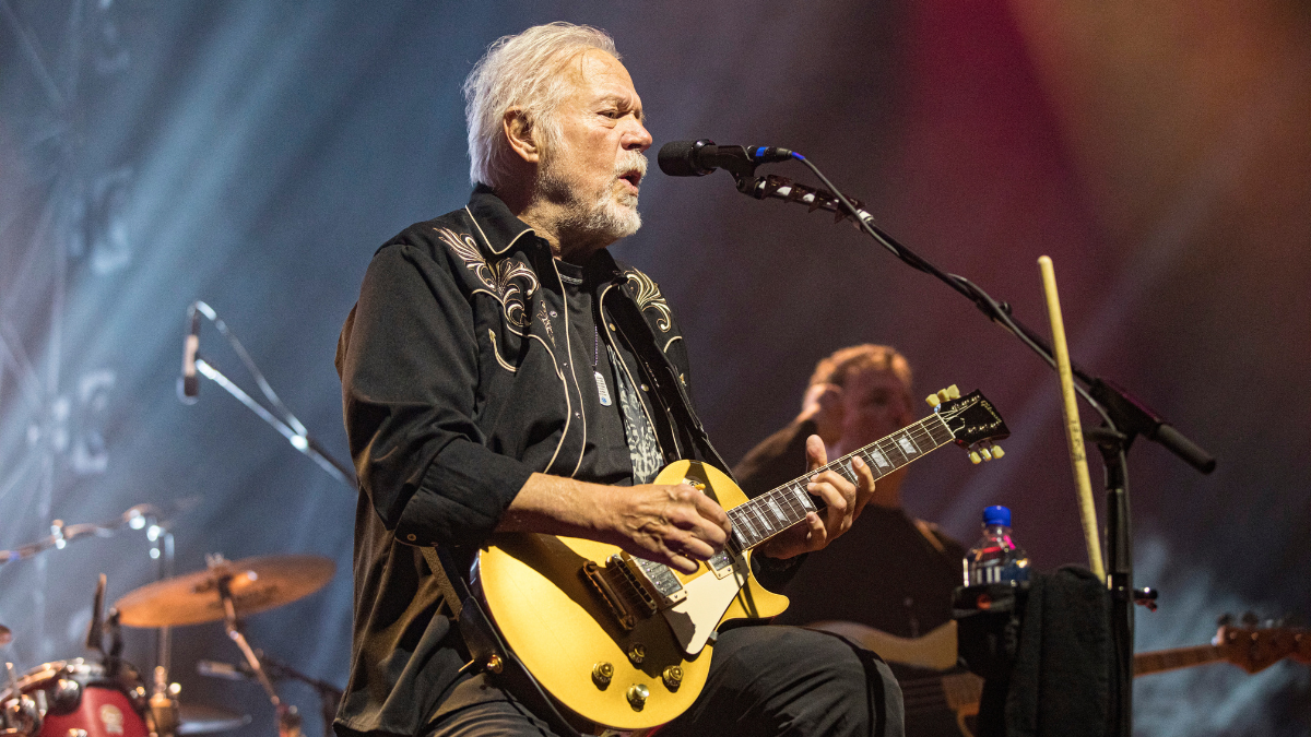  Randy Bachman playing a Gibson les paul. 