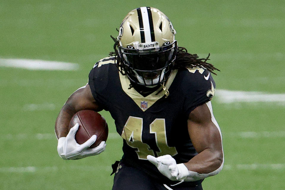 NEW ORLEANS, LOUISIANA - JANUARY 10: Alvin Kamara #41 of the New Orleans Saints runs with the ball during the second quarter against the Chicago Bears in the NFC Wild Card Playoff game at Mercedes Benz Superdome on January 10, 2021 in New Orleans, Louisiana. (Photo by Chris Graythen/Getty Images)