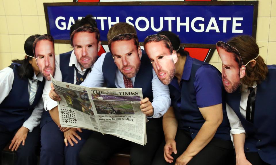 No masking it: England fans at Southgate tube station, temporarily renamed in honour of England’s manager.