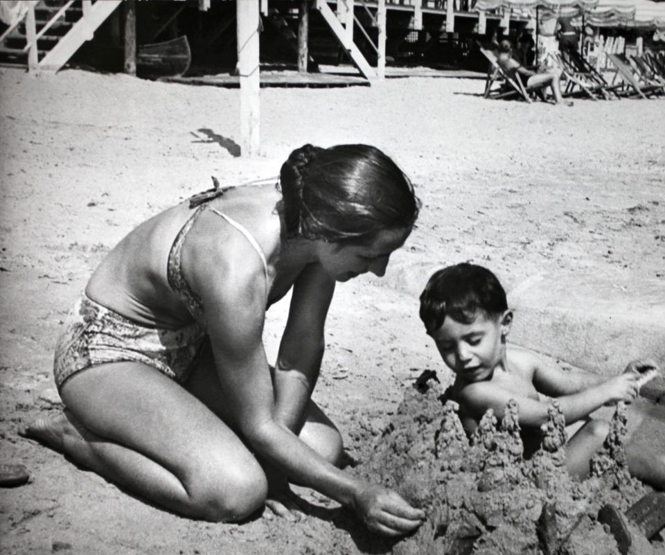 On the Golfe-Juan beach with her son Claude, circa 1950 - Michel MAKO/Gamma-Rapho via Getty Images