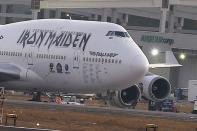 FILE PHOTO: Ed Force One, the aeroplane of British heavy metal band Iron Maiden, is seen parked with its engines damaged after being hit by a tractor in Santiago