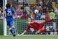 Italy's Andrea Pirlo scores a penalty during a penalty shoot-out at the Euro 2012 quarter-final match against England on June 24. Italy won 4-2 on penalties