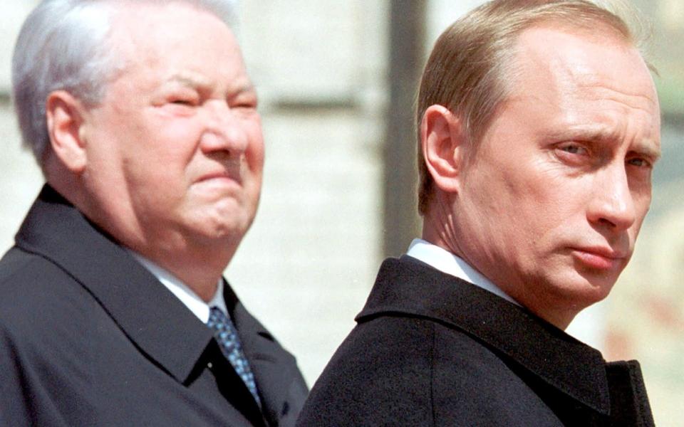 Vladimir Putin with Boris Yeltsin - Itar Tass/File Photo