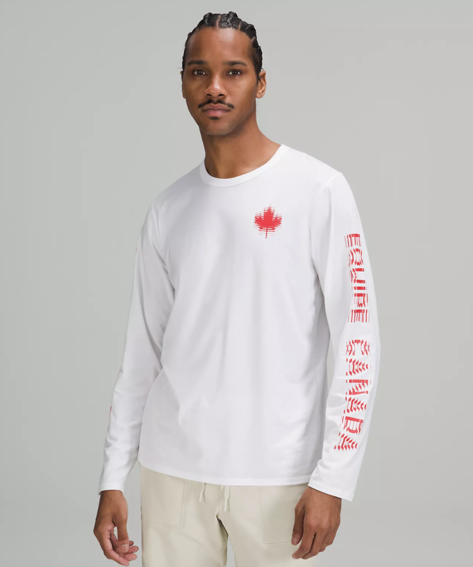 man in long sleeve white shirt, Team Canada The Fundamental Long Sleeve Shirt (Photo via Lululemon)