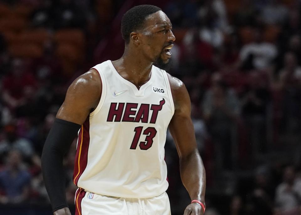 Miami Heat center Bam Adebayo gestures after scoring during the first half of the team's NBA basketball game against the Chicago Bulls, Monday, Feb. 28, 2022, in Miami. (AP Photo/Marta Lavandier)