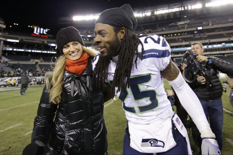 Erin Andrews with Seahawks cornerback Richard Sherman after a 2014 game. (AP)