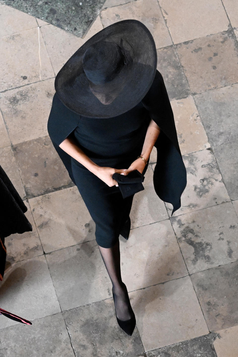 Britain's Meghan, Duchess of Sussex arrives at Westminster Abbey in London on September 19, 2022, for the State Funeral Service for Britain's Queen Elizabeth II. - Leaders from around the world will attend the state funeral of Queen Elizabeth II. The country's longest-serving monarch, who died aged 96 after 70 years on the throne, will be honoured with a state funeral on Monday morning at Westminster Abbey. (Photo by Gareth Cattermole / POOL / AFP) (Photo by GARETH CATTERMOLE/POOL/AFP via Getty Images)