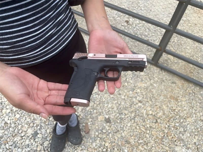 Vanessa, a neighbor of Francisco Oropesa, said she bought a gun after Friday's mass shooting. (Antonio Planas / NBC News)